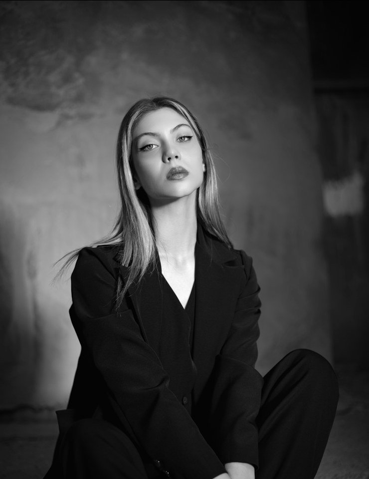 Portrait of a woman in a tailored suit